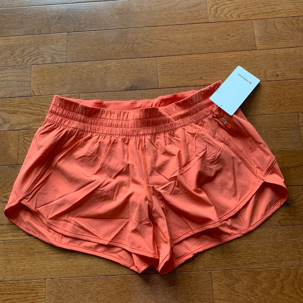 🔥LULULEMON TRACKER SHORT 4”-WARM CORAL, 10/12/14